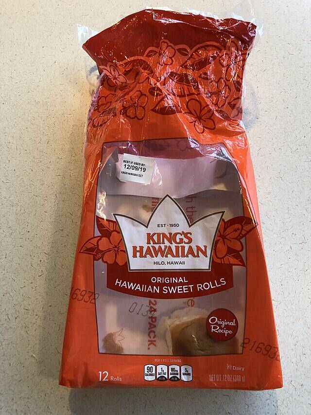 Two rolls in a King's Hawaiian package that's been opened on a kitchen counter
