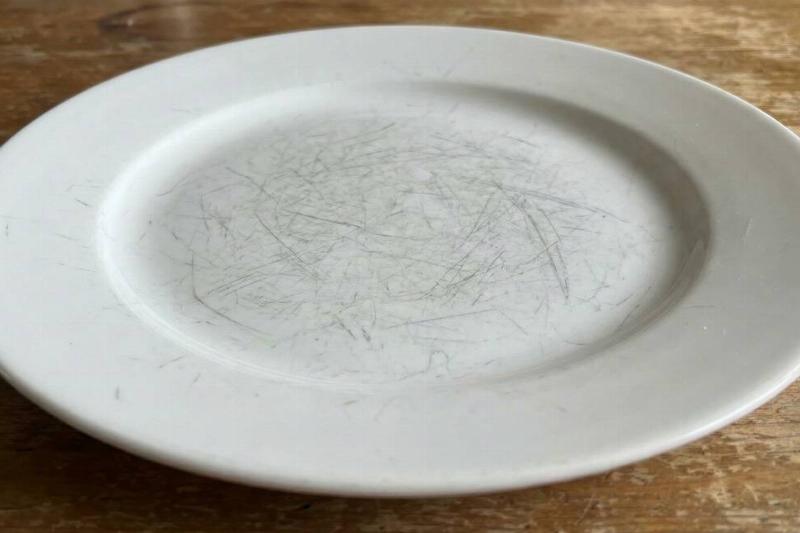 A plate with scratches on it. 