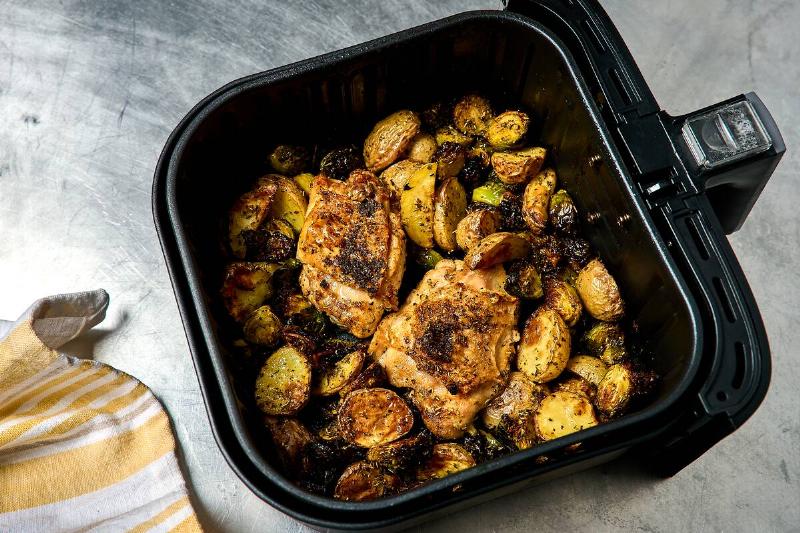 Air Fryer Chicken Thighs With Potatoes and Brussels Sprouts for Dinner in Minutes column in Food