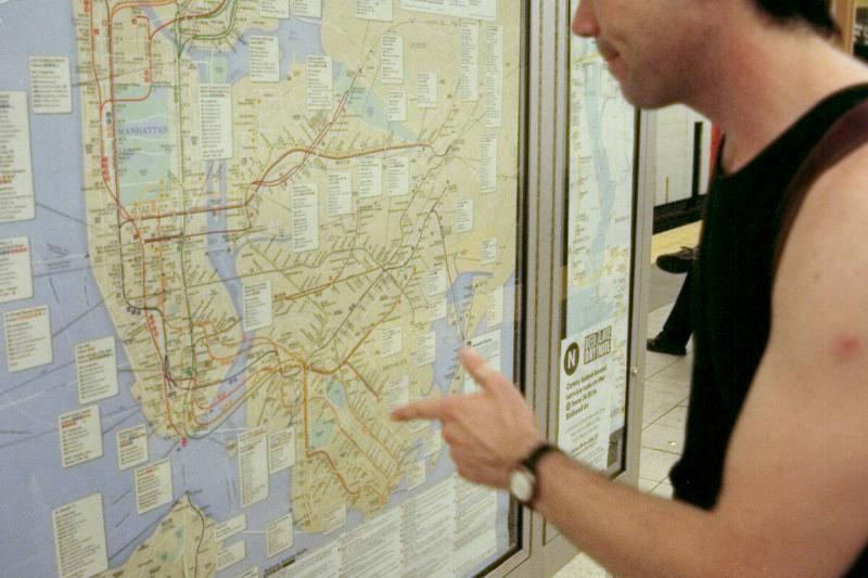 Andrew Cicchetti reads subway map at 36th St. and Fourth Ave