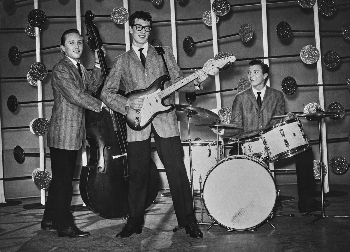 Buddy Holly and the Crickets performing on stage
