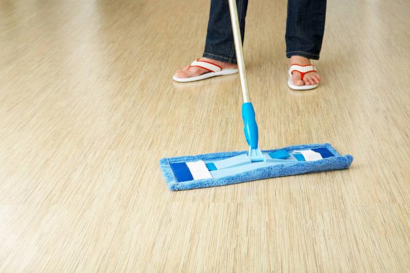 Microfiber flat mop on the floor. 