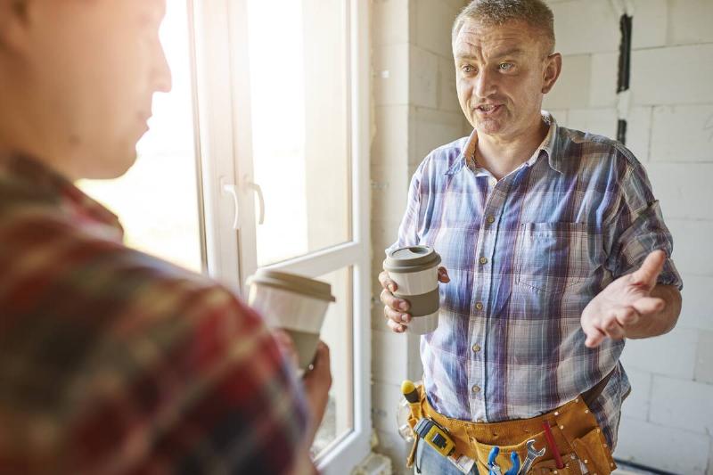 Contractor asking questions to homeowner. 