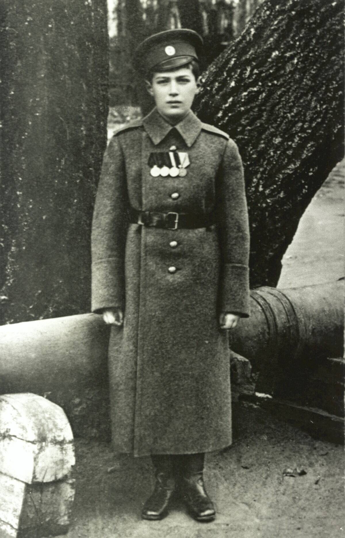 Tsarevich Alexei standing in military dress