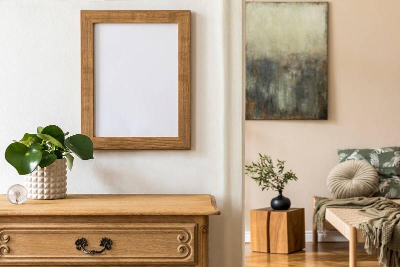 Two rooms in an apartment with the same kinds of wood furniture. 