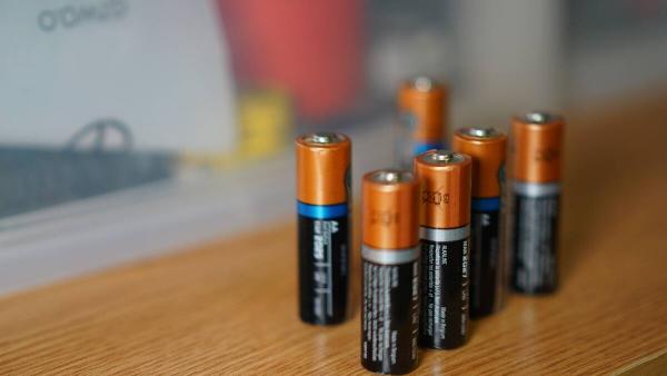 Lithium AA batteries on a table. 