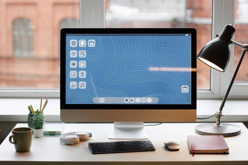 A computer monitor with organized icons. 