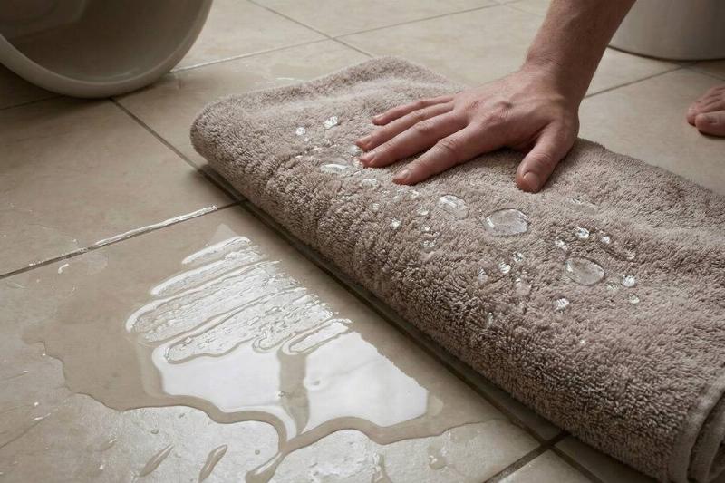 A towel pushing water instead of absorbing it. 