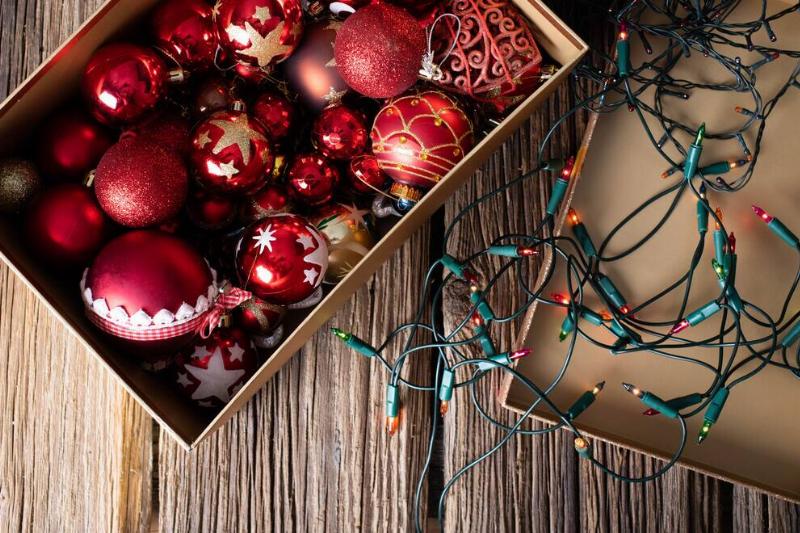 Red Christmas decorations in a box. 