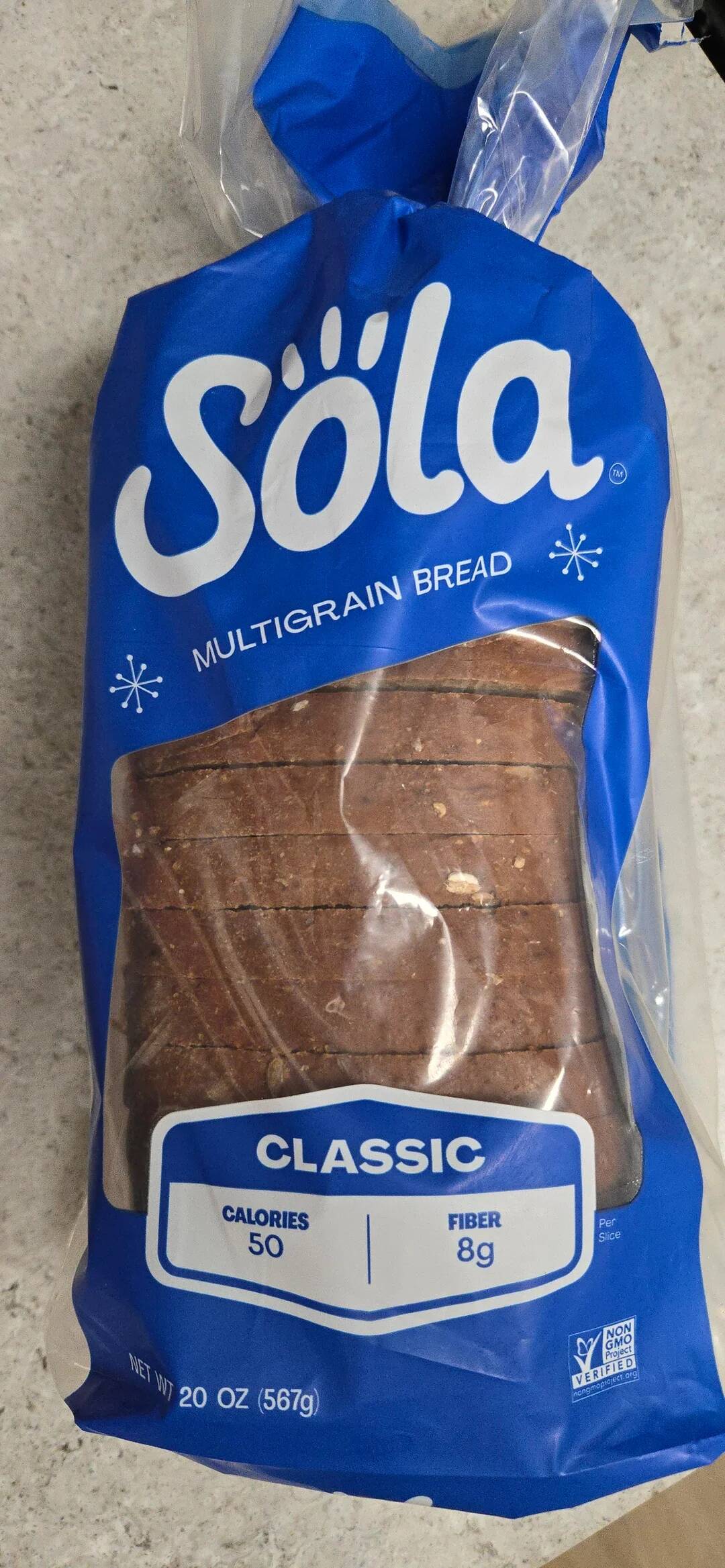 Loaf of Sola multigrain bread placed on a kitchen counter