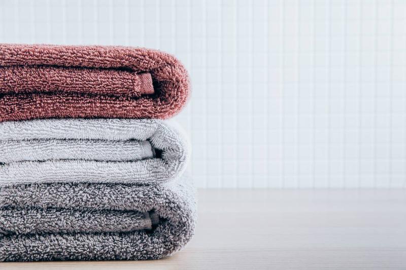 A stack of three towels. 