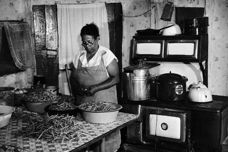 Woman Working In Kitchen Cooking