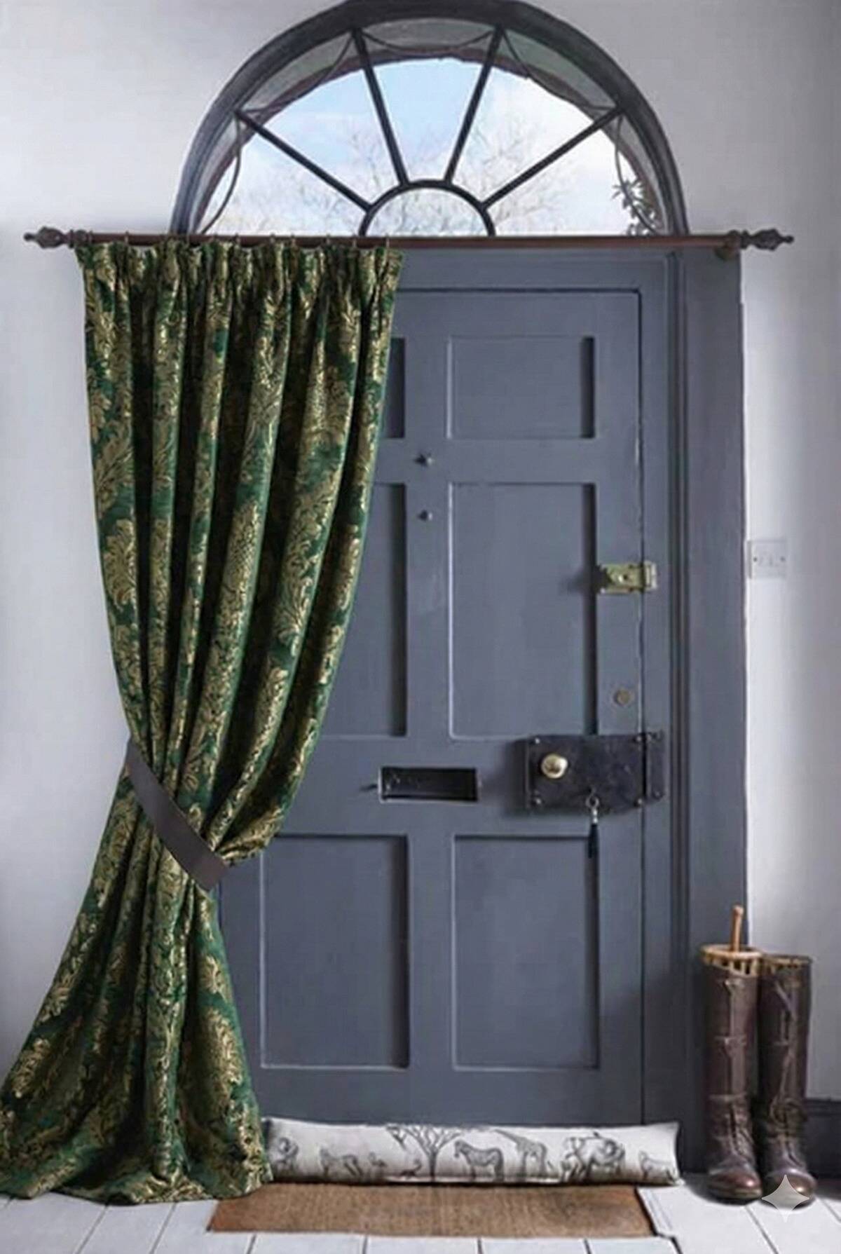 A heavy curtain hanging over a door. 