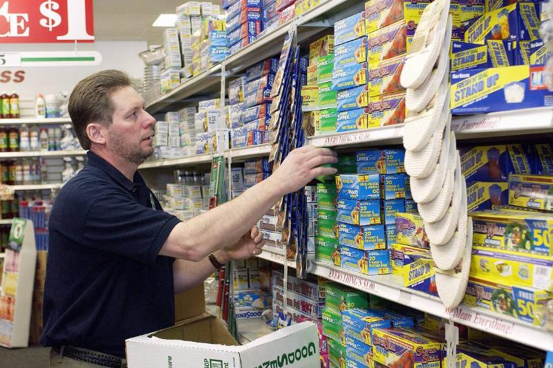 Man shopping at Dollar Tree. 