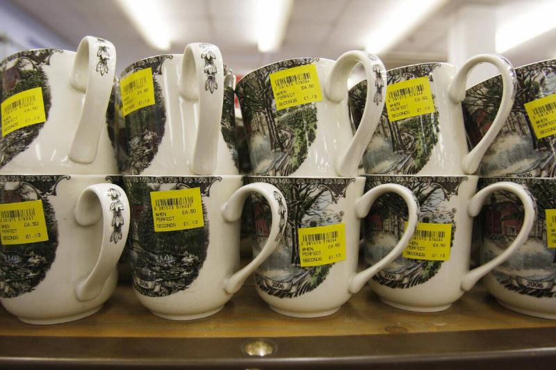Price stickers on a mug in a store. 
