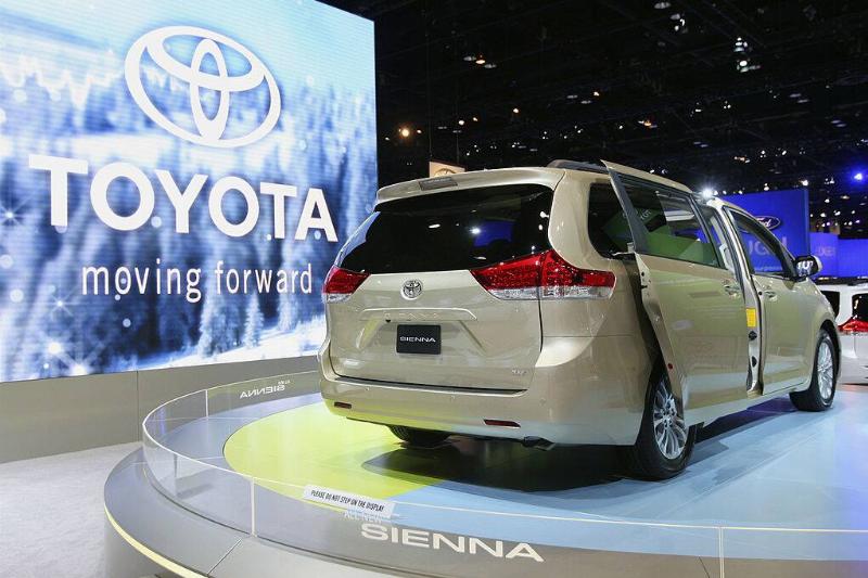 Beige 2010 Toyota Sienna on display