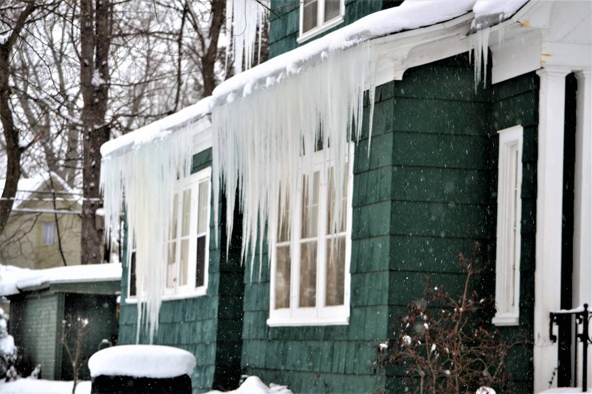 Ice dm created icicles on house. 