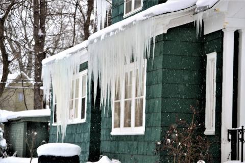 Ice dm created icicles on house. 