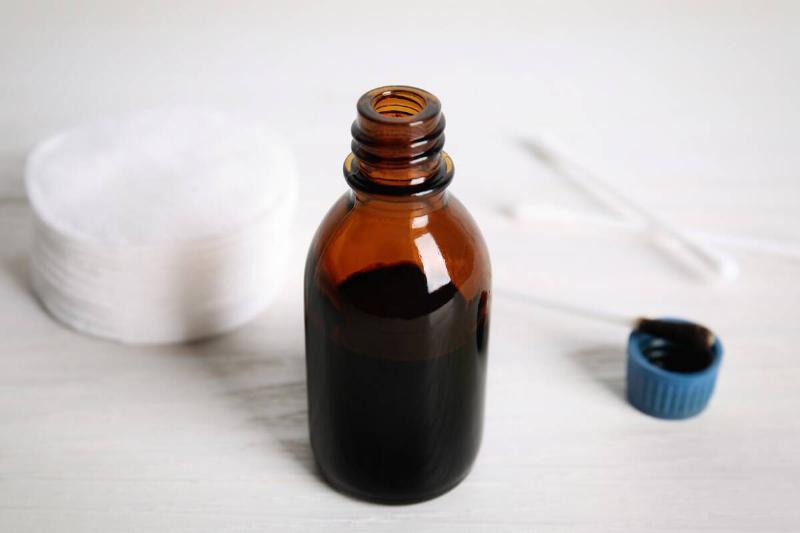 Brown bottle of hydrogen peroxide. 
