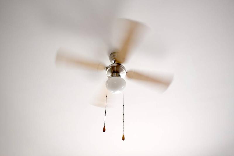 Spinning ceiling fan.
