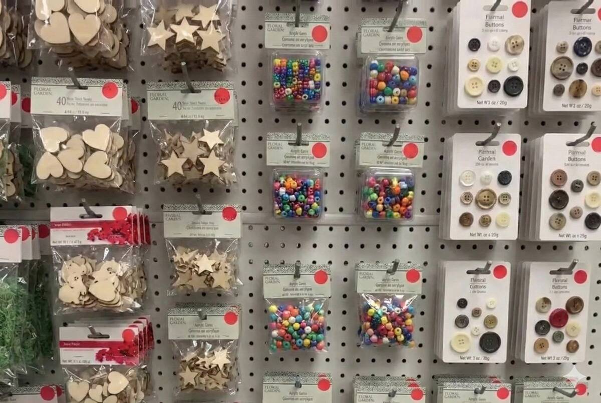 Red dot stickers on craft supplies at Dollar Tree. 