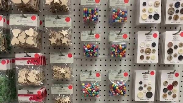 Red dot stickers on craft supplies at Dollar Tree. 