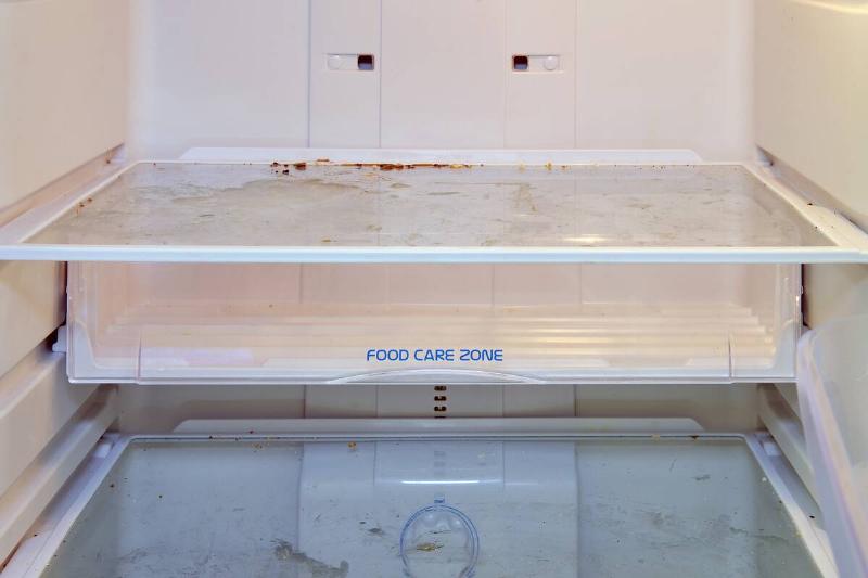 A spill inside of a fridge shelf. 