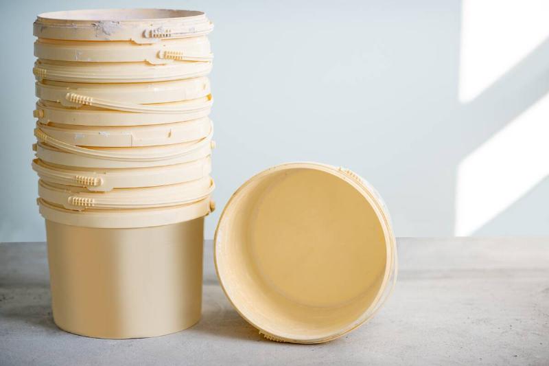 Empty 5 gallon buckets stacked up. 