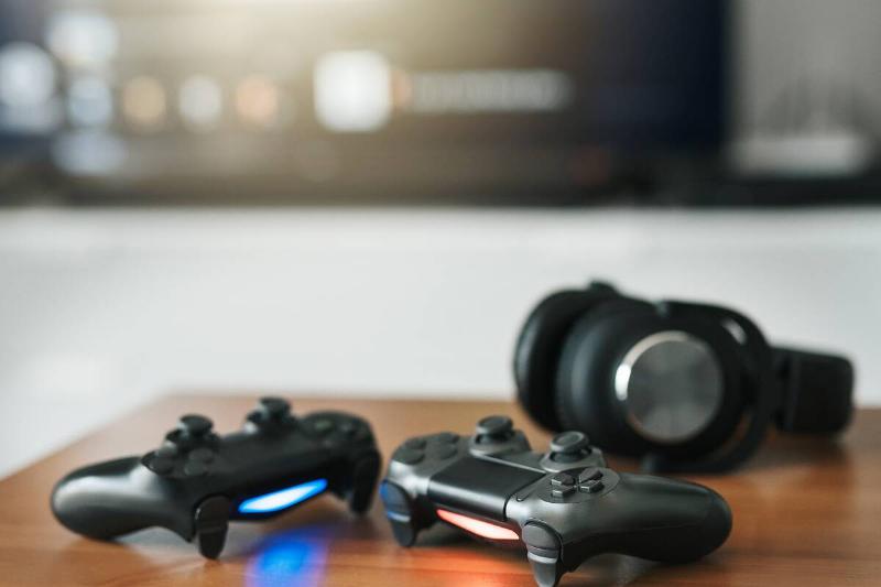 Video game controllers on a table. 