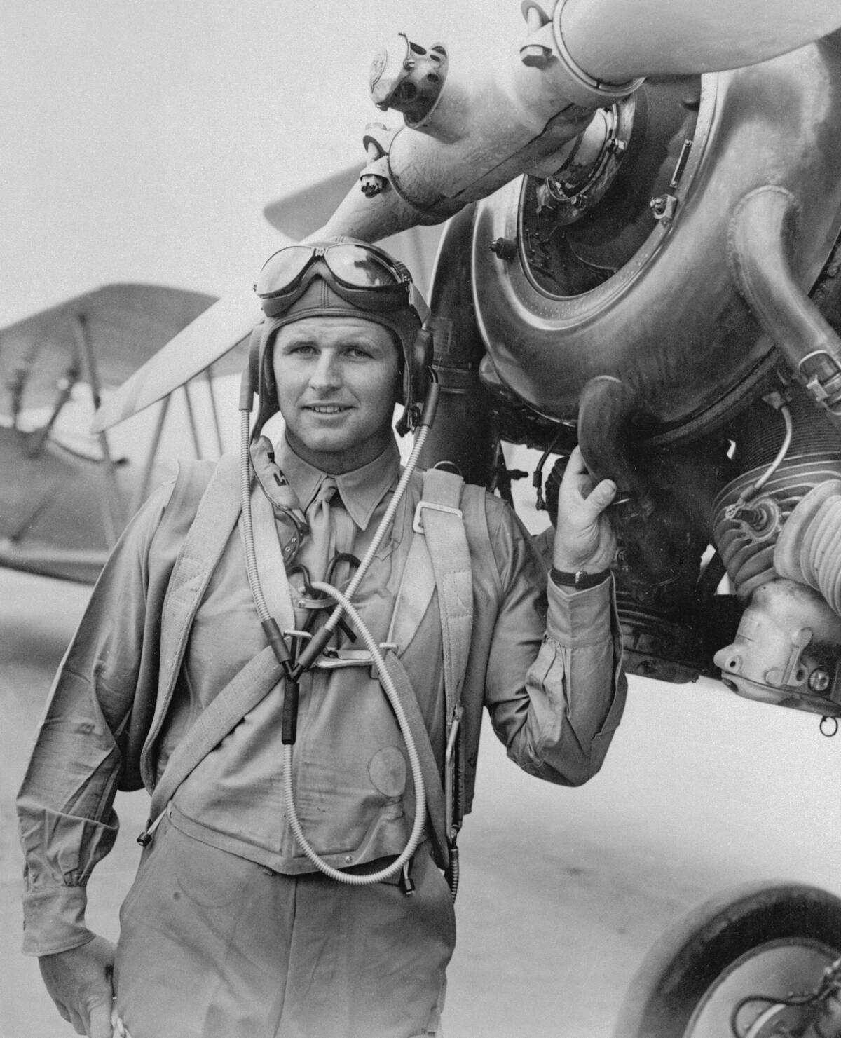 Joseph P. Kennedy Jr. Standing by Propeller of Plane