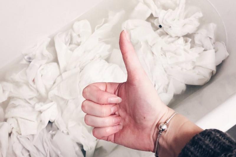 Sheets soaking in a basin. 