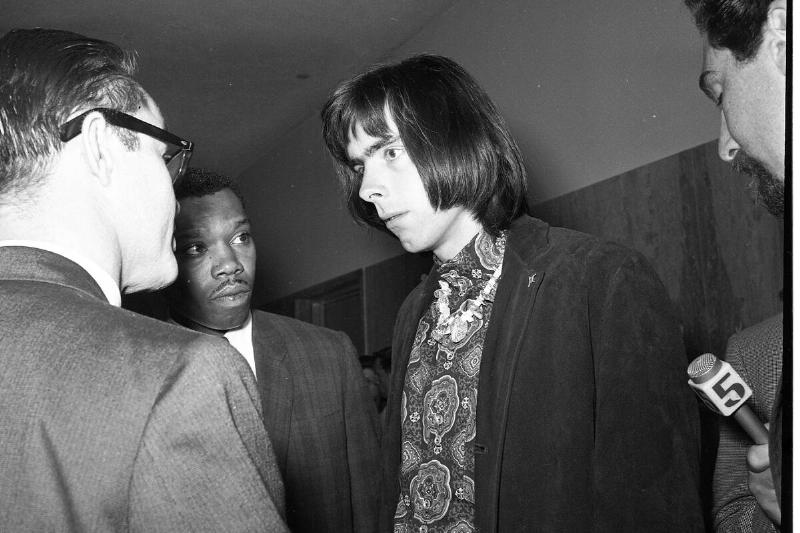 Oct. 20, 1967: Grateful Dead band manager Rock Scully talks to reporters after a narcotics bust of the group's home at 710 Ashbury St.