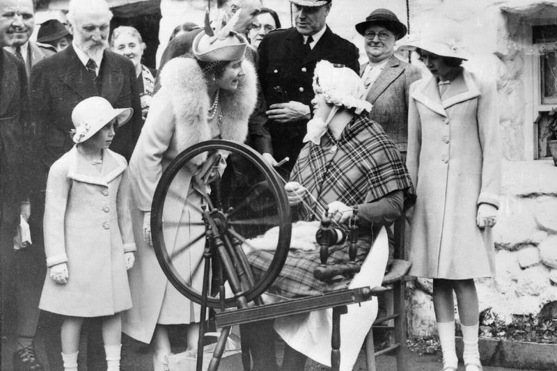 Queen Elizabeth and Daughters Watching Woman at Spinning Wheel