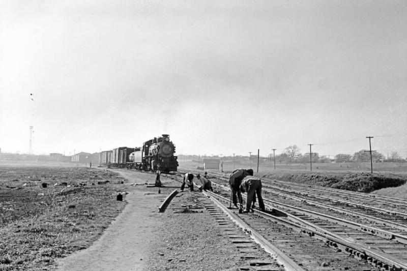 section-crew-performing-track-maintenance-locomotive-494-texas-and-pacific-7fbcae-1024x697