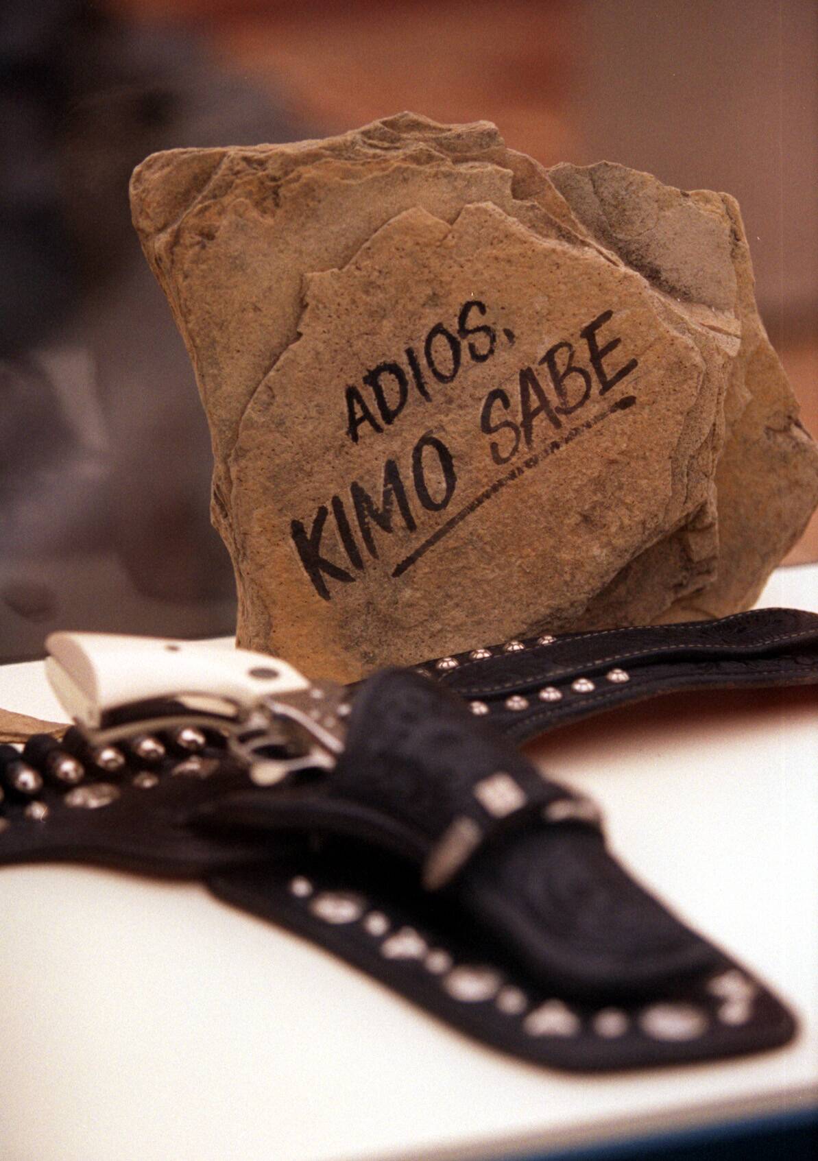 The gun of the Lone Ranger, Clayton Moore, along with a message to him, sits on display at the Gene