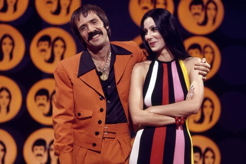 Sonny Bono and Cher standing on the set of 'The Sonny and Cher Comedy Hour'