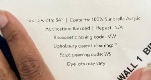 This Tiny Tag Tells You Exactly How To Clean Your Couch