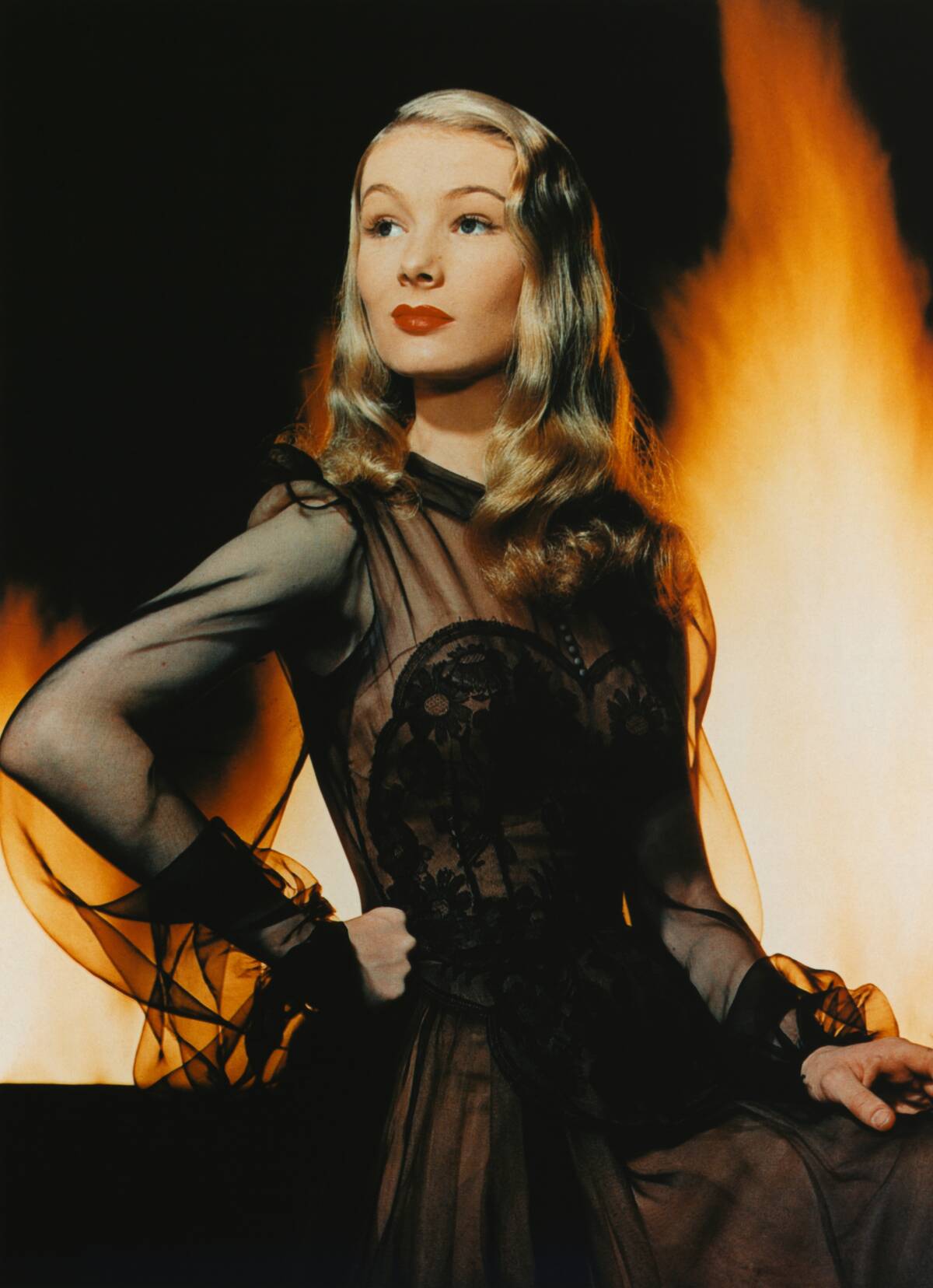 Veronica Lake in Front of Flames