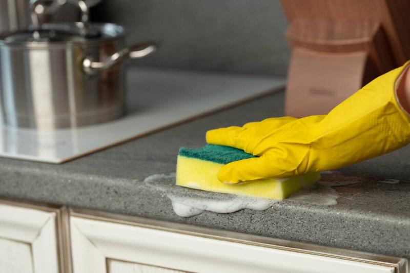 Kitchen sponge cleaning counter.