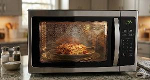 The Real Reason Why Microwave Doors Have Black Dots