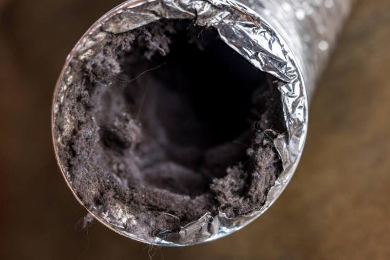 Lint inside of a dryer vent. 
