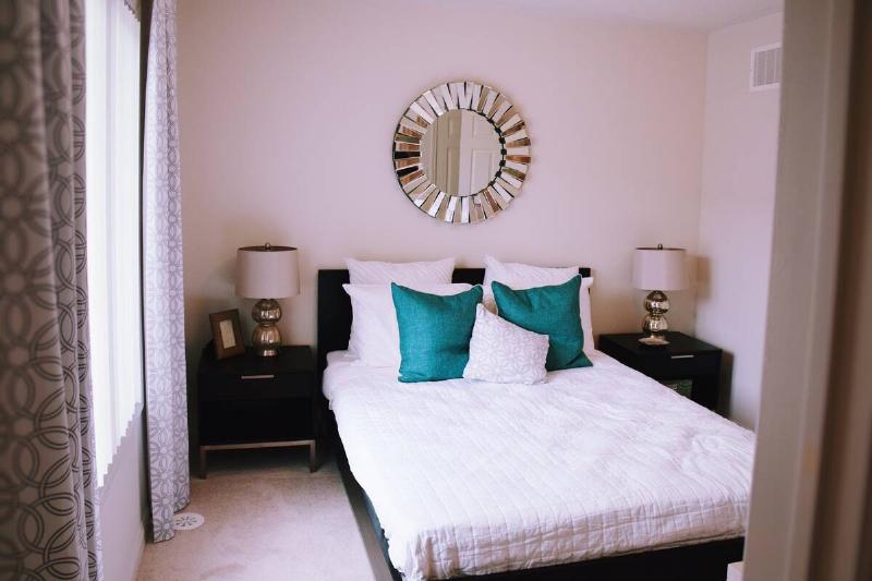 A bed in a guest bedroom. 