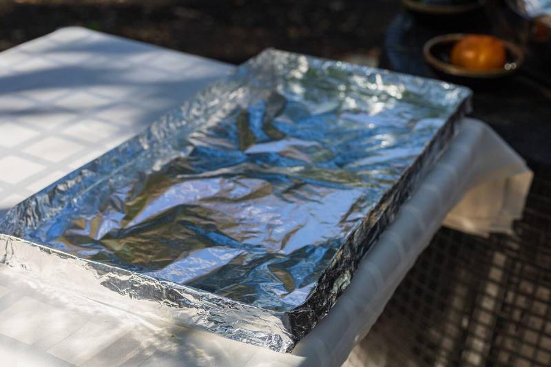 Aluminum foil covering a pan outside. 