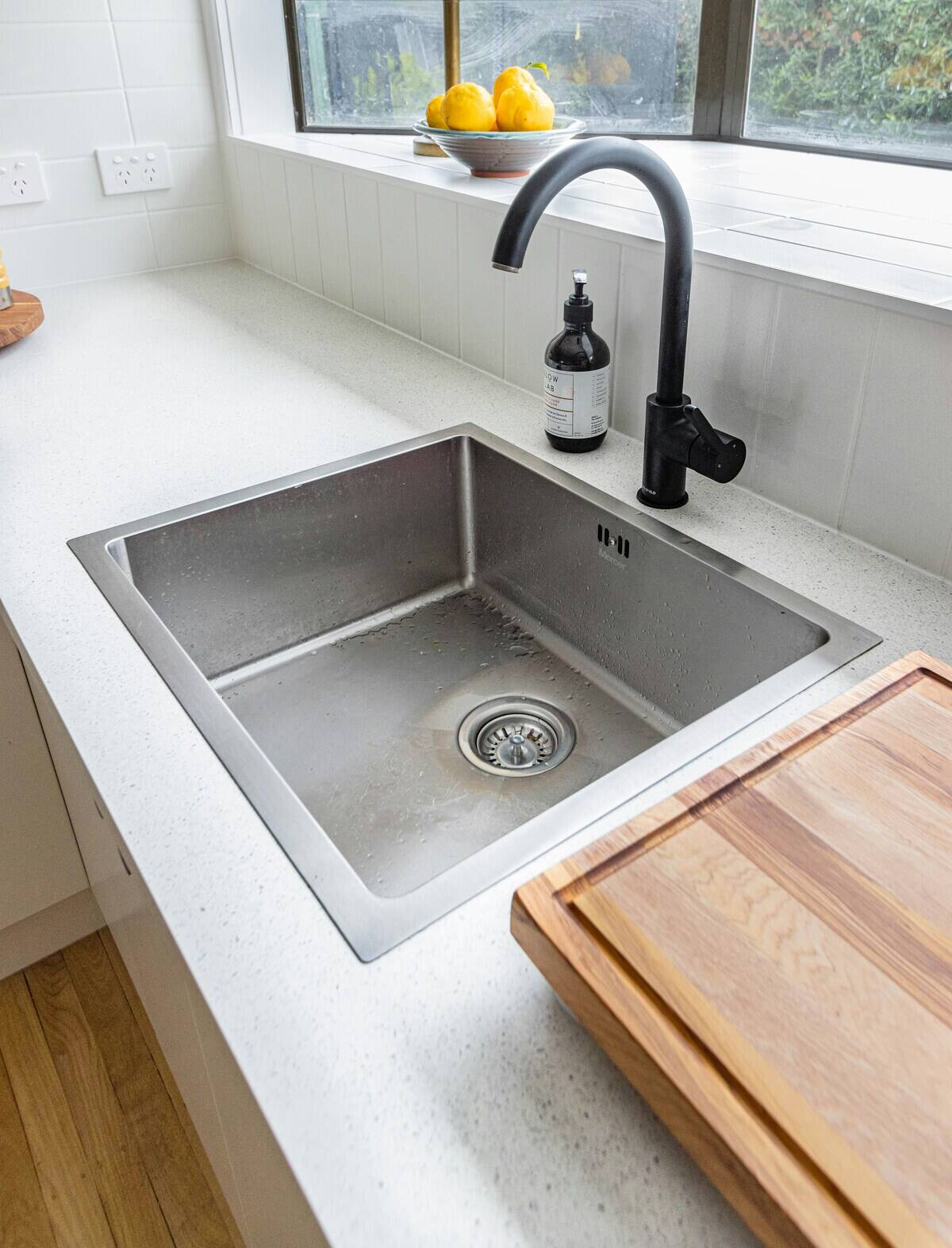 Overhead view of a metal kitchen sink