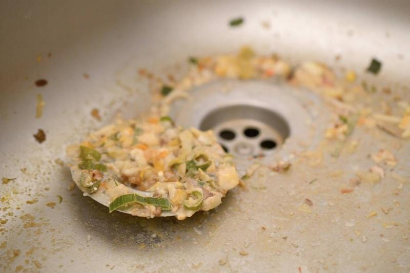 Dirty food clog kitchen sink. 