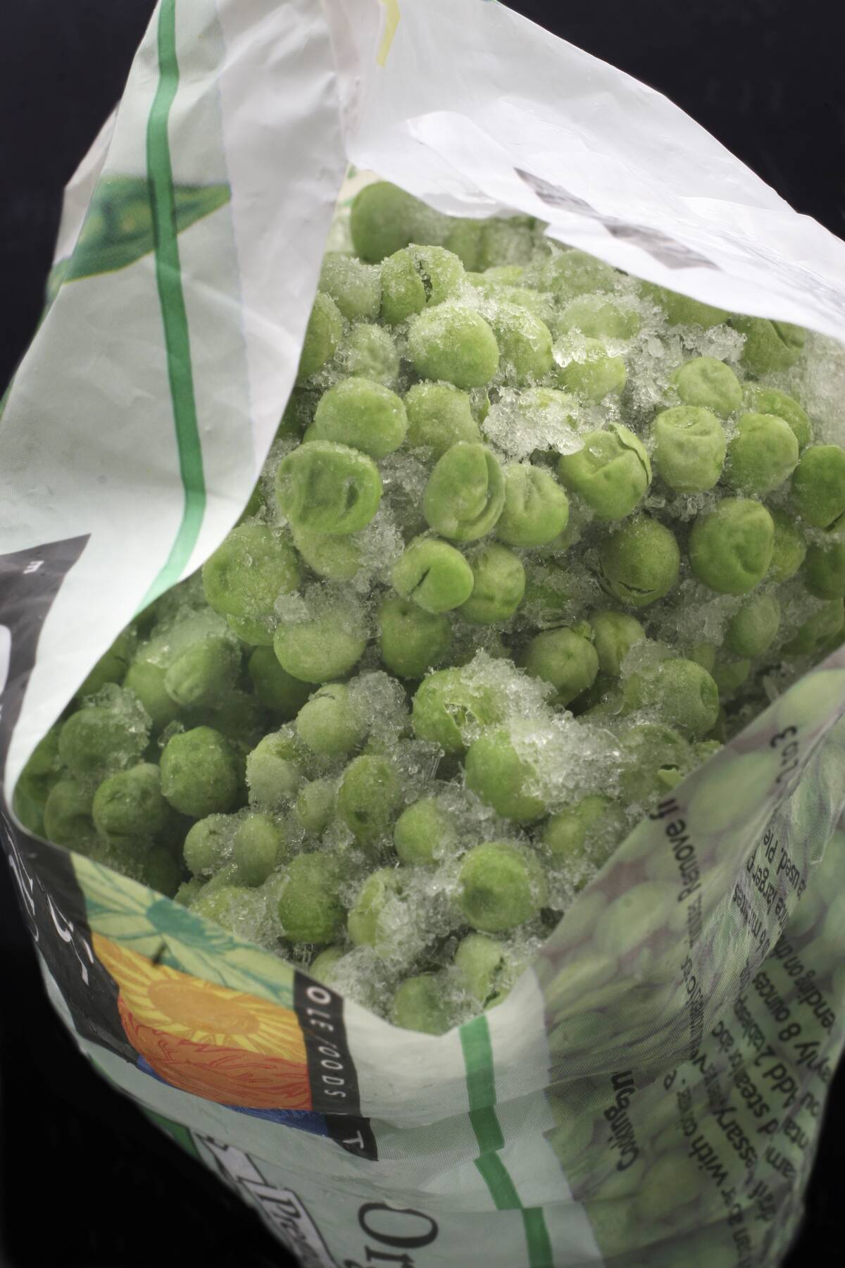 Bag of peas covered in freezer burn