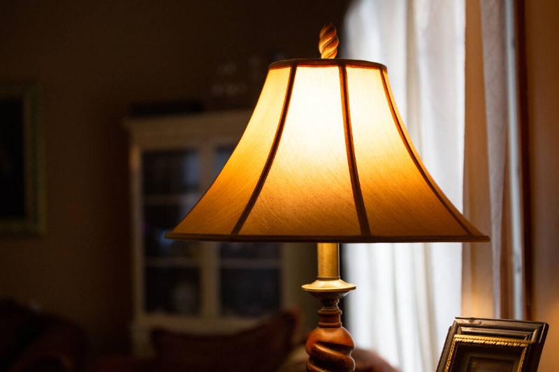 A lampshade over a light. 