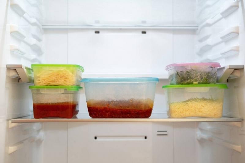 Containers filled with food in a fridge