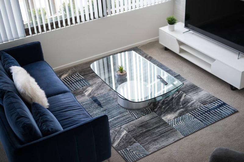 Glass coffee table in living room.