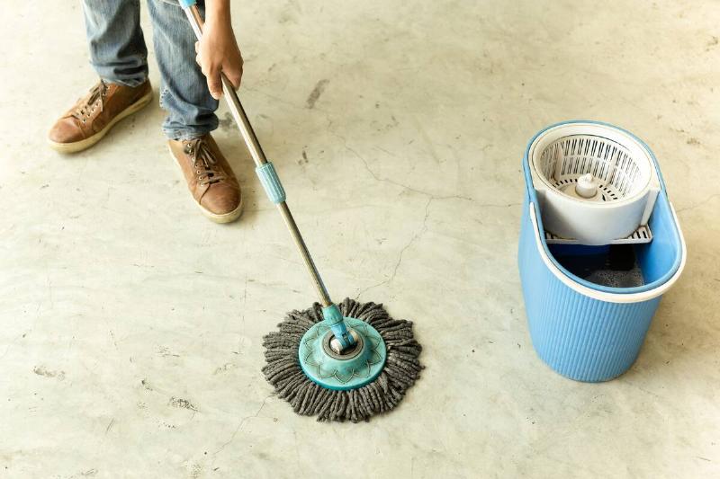 A mop on the ground. 